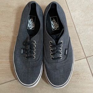 Dark grey vans, lightly used. Men 7, women 8.5